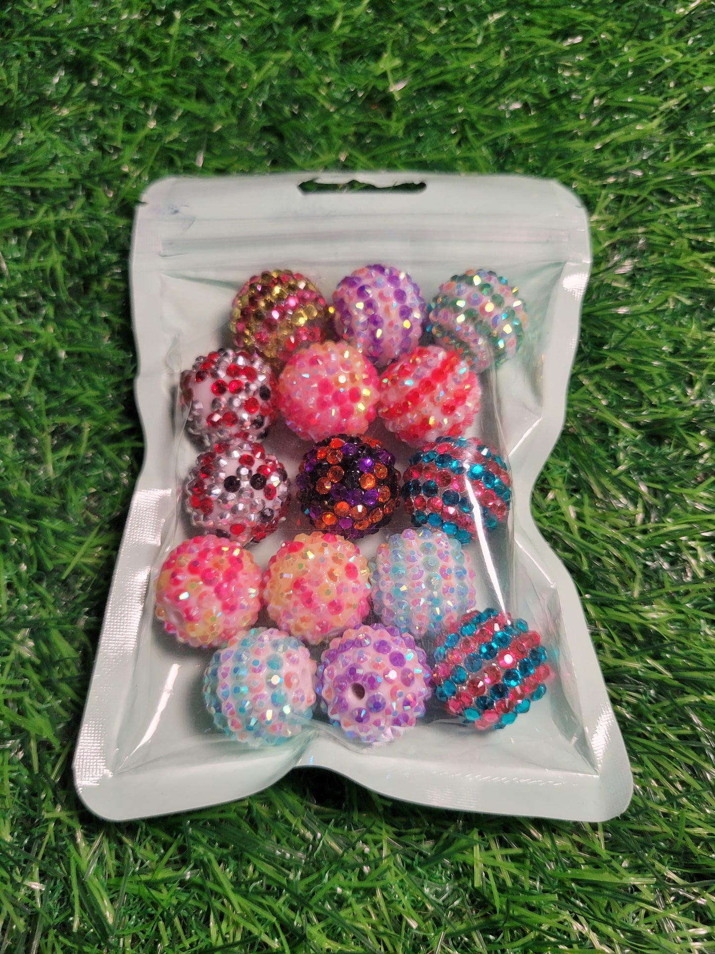 Rhinestone and hand painted beads.